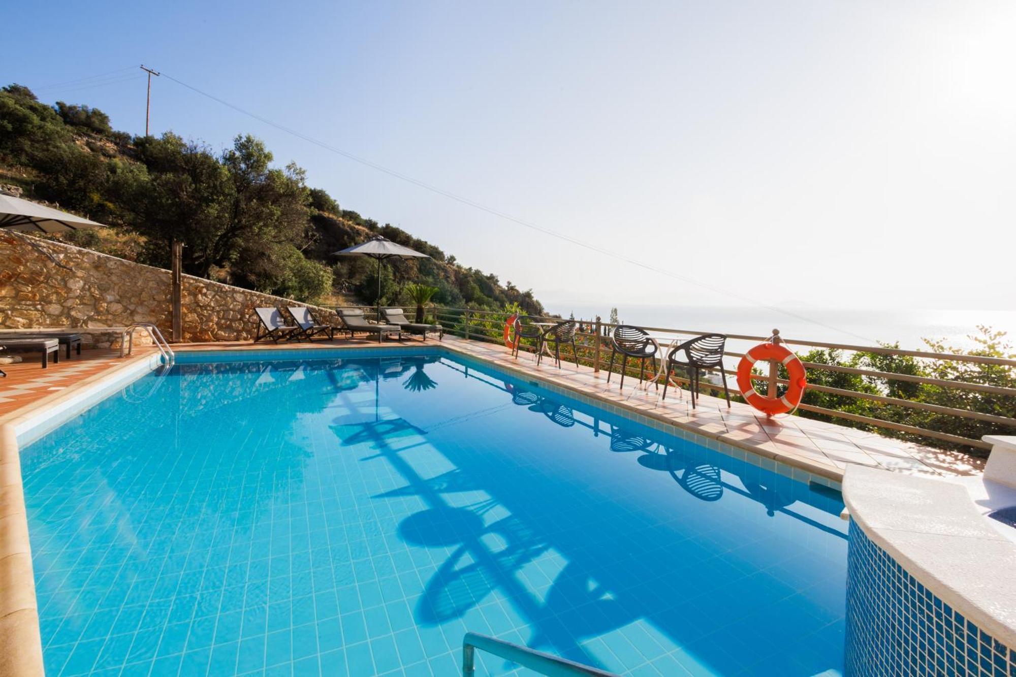 Blue Horizon Suites Parálion Ástros Esterno foto
